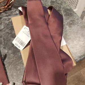 2 plum coloured ties. 13$ each.